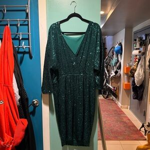 Green sequin surplice dress.